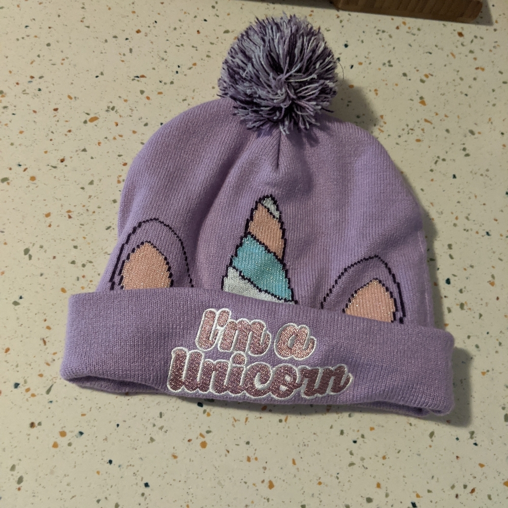 Purple unicorn knit hat